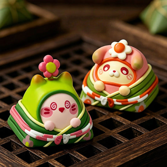 Pair of cute Keycapper rice dumpling artisan keycaps with flower toppers resting on a wooden lattice tray