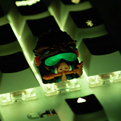 Glow effect and RGB backlit green visor of the Cyberpunk Pigsy artisan keycap by Keycapper in the dark.