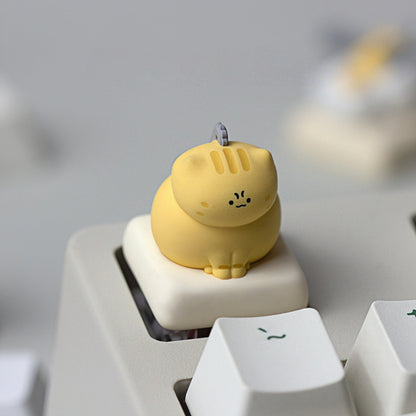 Keycapper Chainsaw Kitty calico resin artisan keycap with chainsaw blade close up