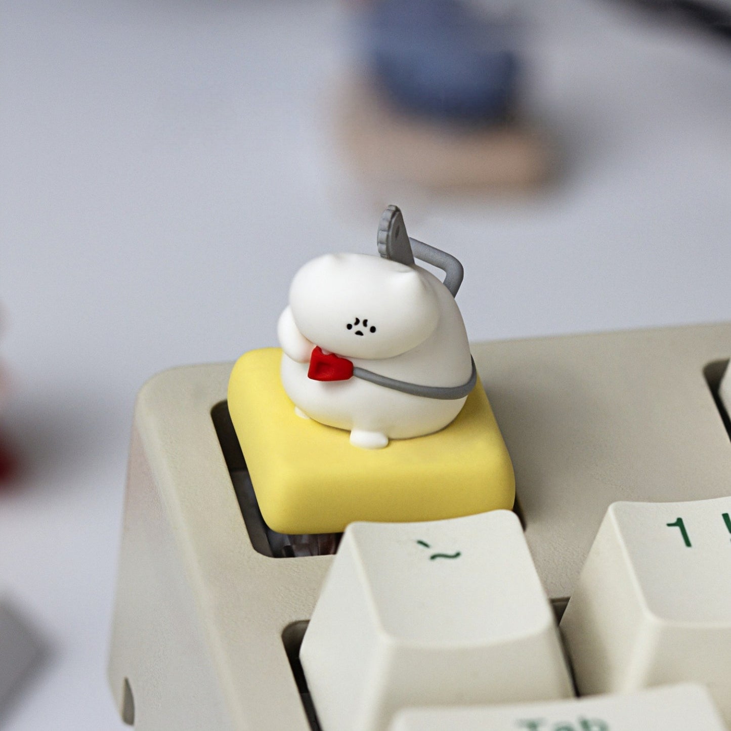 Keycapper Chainsaw Kitty white cat with red collar resin keycap top view