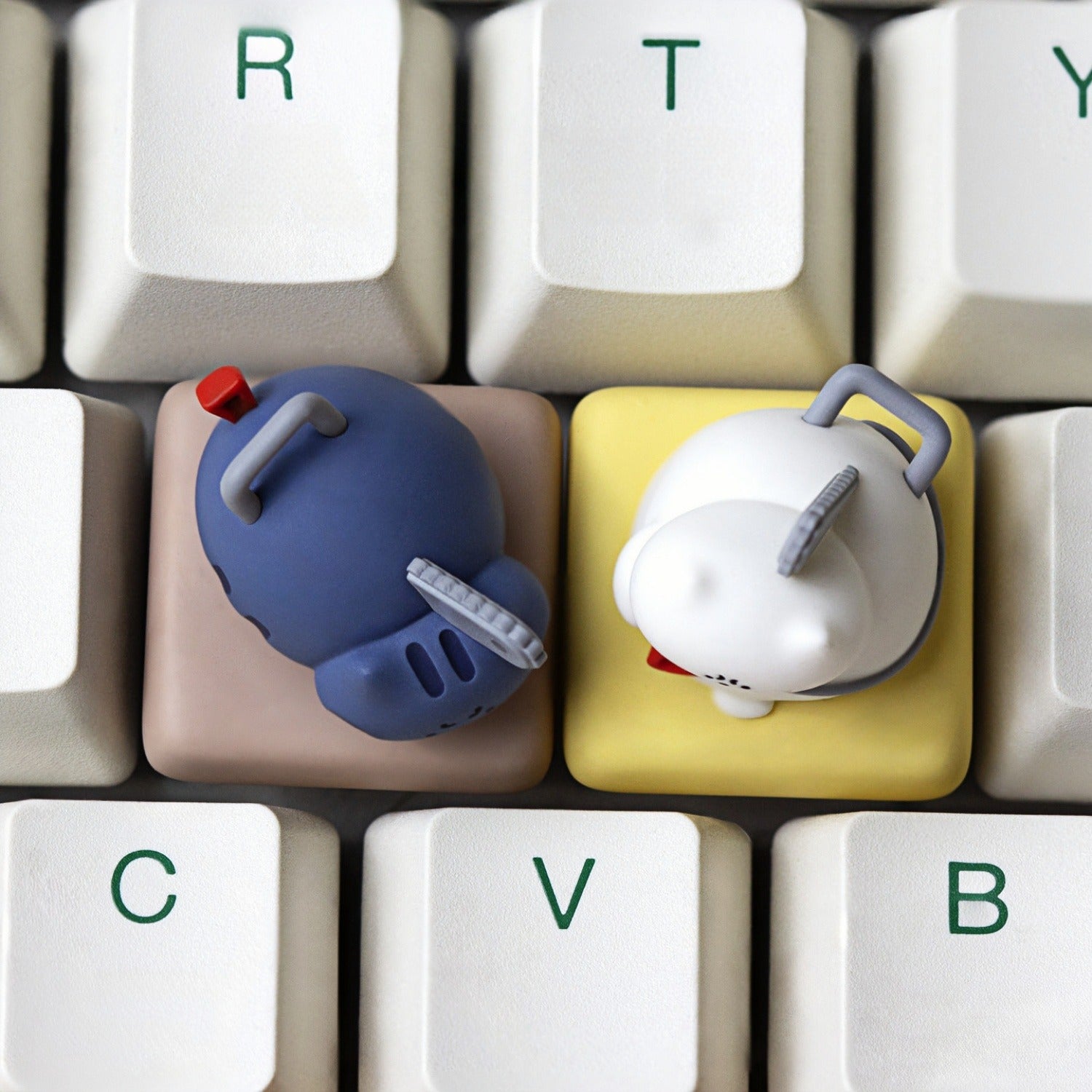 Top down view of Keycapper Chainsaw Kitty dark blue and white cat artisan keycaps